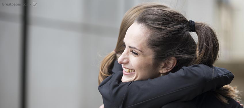 Two Girls Greeting Each Other